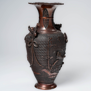 Japanese Meiji period (1868-1912) bronze vase with relief decoration.