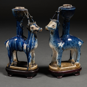 Pair of animal-shaped candlesticks in blue glazed ceramic. Chinese work, XIX-XX Century