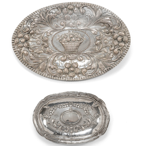 Set of two late 19th-20th century embossed silver trays.