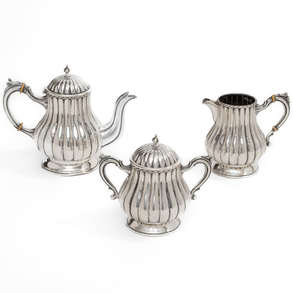 Set of coffee pot, milk jug and sugar bowl in Spanish silver, 20th century.