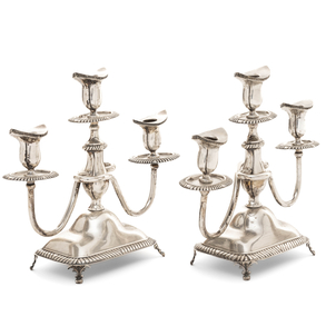 Pair of three-light candlesticks in Spanish silver, 20th century.