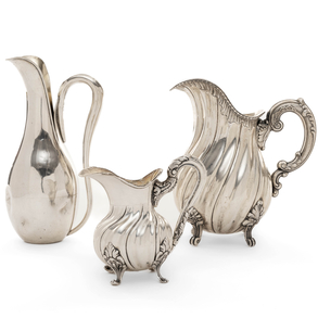 Set of three Spanish silver water jugs, 20th century.