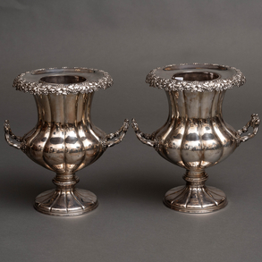 A pair of 20th century silver plated metal amphora-shaped goblets with two handles.