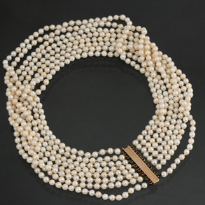 Eight strand cultured pearl necklace with 14kt yellow gold clasp.