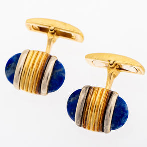 Pair of cufflinks in 18kt yellow gold and 18kt white gold.