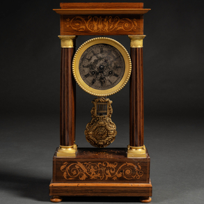 A 19th century wooden portico clock with gilt-bronze applications.