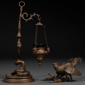 Set of votive lamp in the form of a snake in the shape of a bird in bronze. 20th century