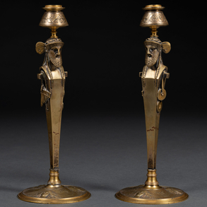 Pair of modernist candlesticks in gilded bronze.