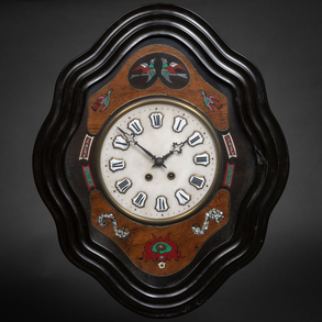 Reloj de pared francés Ojo de Buey Napoleón III en madera lacada en negro del siglo XIX.